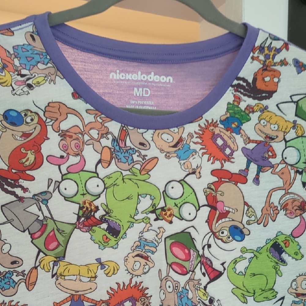 Nickelodeon character shirt. Backside is solid purple.